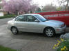 McKay and Katie's new car and the roof dumpster, 9 April 2007
